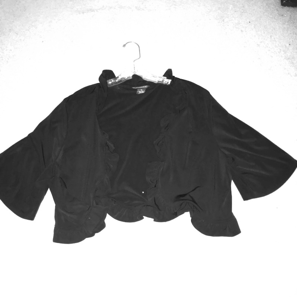 A black top to be used over a little black dress